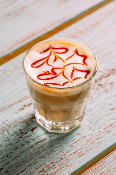 istock Delicious Caramel Macchiato on a Rustic Background 1287648815