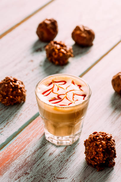 istock Delicious Caramel Macchiato on a Rustic Background 1287648947
