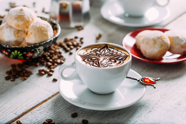 istock Delicious Coffee Latte on a White Wooden Table 1287650907