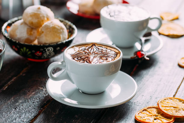 istock Delicious Coffee Latte on a White Wooden Table 1287651643