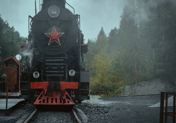 Old retro vintage steam train on platform station Ruskeala Park
