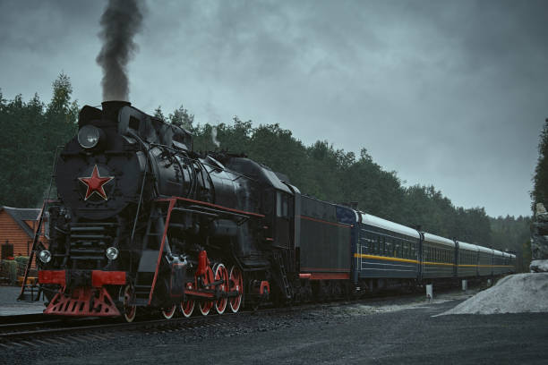 istock Old retro vintage steam train on platform station Ruskeala Park 1287655808