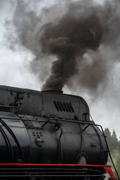 istock Old retro vintage steam train on platform station Ruskeala Park 1287655829