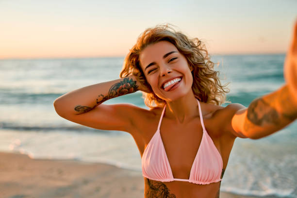 istock Girls on the beach. 1287656314