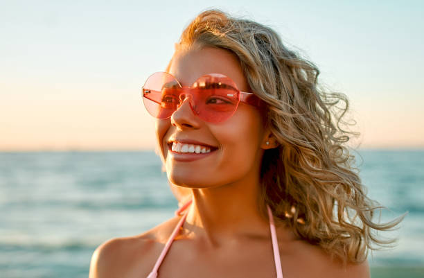istock Girls on the beach. 1287656373