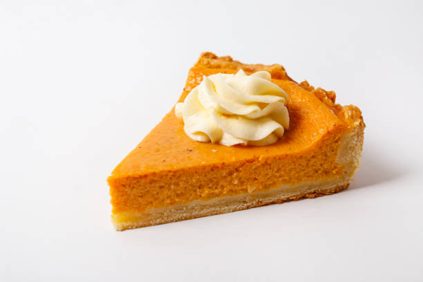 Pumpkin pie made of organic ingredients. Traditional thanksgiving food concept. Orange delicious homemade pumpkin pie with crust on grunged wood textured table. .Top view, close up, copy space, background. carrot cake day stock pictures, royalty-free photos & images