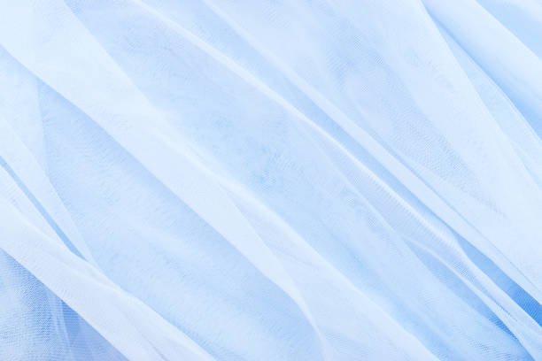 istock Creative background of blue tulle. Abstract texture. 1287657229