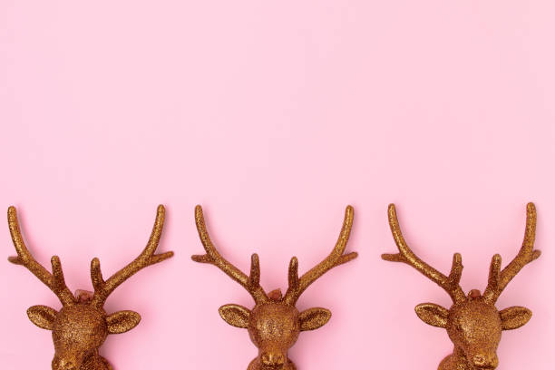 istock flat lay with christmas reindeer on pink 1287657244