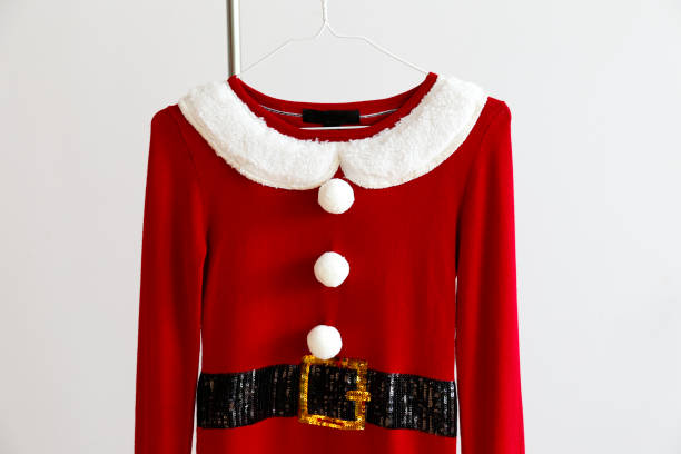 istock Female santa dress on a hanger. 1287657821