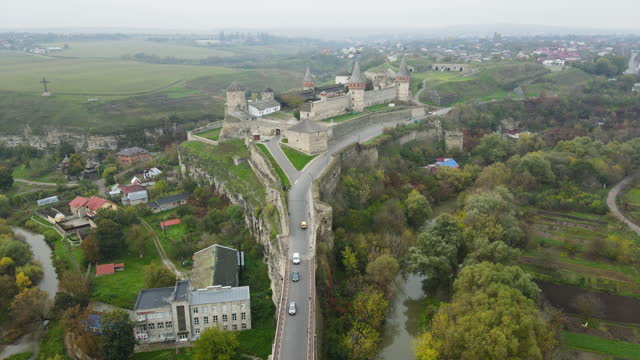 Drone aerial view ancient Kamianets-Podilskyi Castle. Old Kamenetz-Podolsk fortress near Kamianets-Podilskyi town.