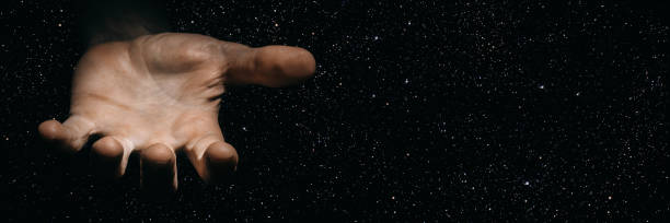 istock visualization god extends the hand of salvation to people 1287664527