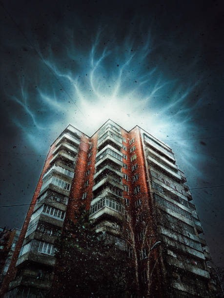 Lightning in the sky over an old tall house. Mysterious flashes of light over a high-rise building. Lightning in the sky over an old tall house. Mysterious flashes of light over a high-rise building. lightning tower stock pictures, royalty-free photos & images