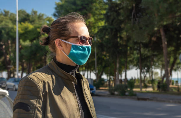 istock Portrait of man with reusable face mask. 1287668910