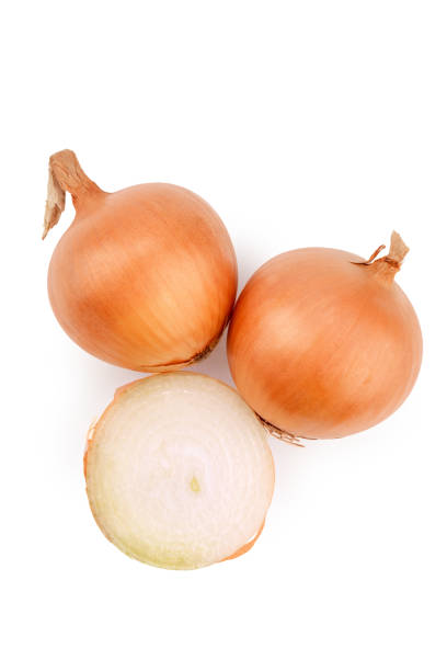 istock white onion in yellow scales and cut, isolate on a white background 1287669103