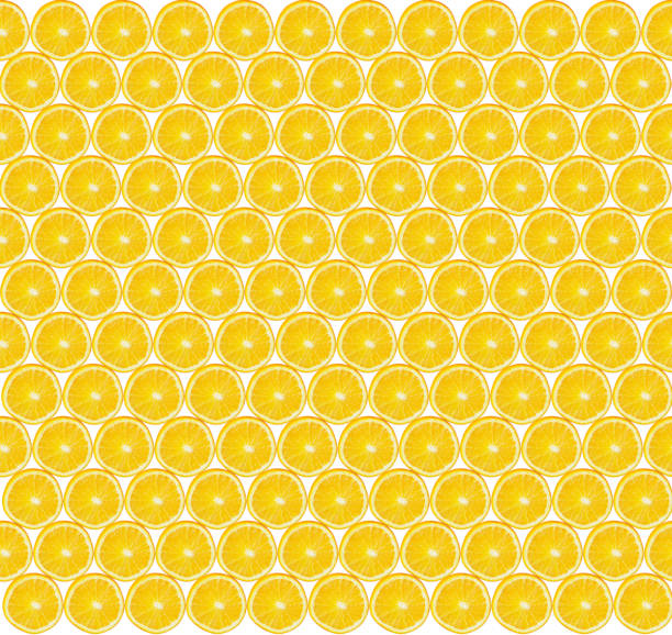 Texture of lemon slices. Yellow texture of sliced lemon slices. Slices of fresh juicy yellow lemons. Yellow fruit cut texture. Citrus pattern. Sour background