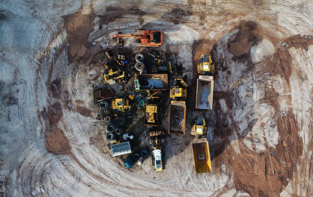 istock Heavy machines, including yellow trucks, in the working environment in a mine 1287671334