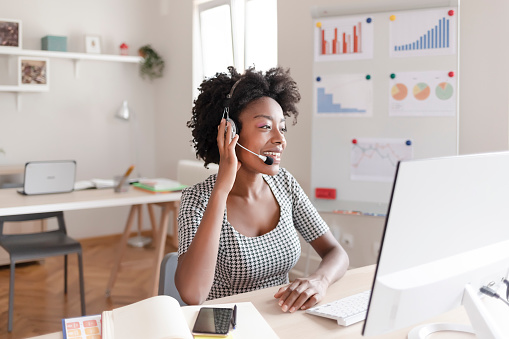 Female African American Customer Support Operator With Headset