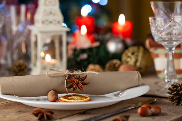 istock Christmas table setting. Holiday Decorations on rustic wooden table. 1287674616