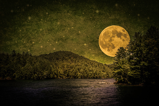 Dramatic Full Moon over Lake and Mountains with Starry Sky - Sepia Toned    Elements of this image furnished by NASA - URL: https://images-assets.nasa.gov/image/GSFC_20171208_Archive_e001433/GSFC_20171208_Archive_e001433~thumb.jpg