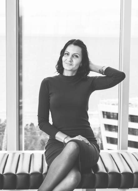 istock Elegant brunette woman inside apartament. 1287681543