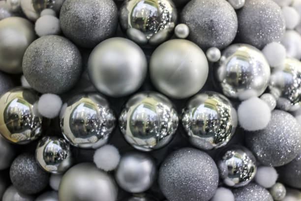 istock Seamless background with silver Christmas balls 1287681853