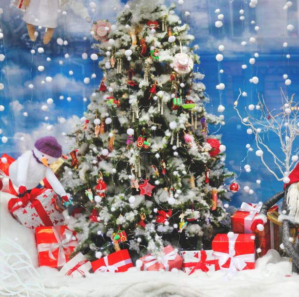 istock decorated Christmas tree with gifts 1287681869