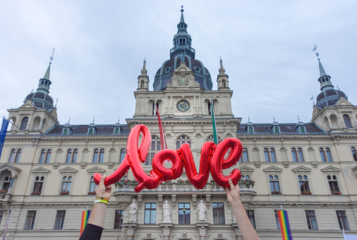 Love sign and beautiful town hall building Rathaus at main square Hauptplatz in Graz, Styria region, Austria