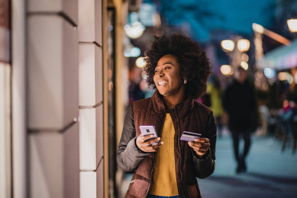 istock African American woman using mobile banking 1287685368