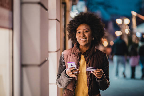 istock African American woman using mobile banking 1287685696
