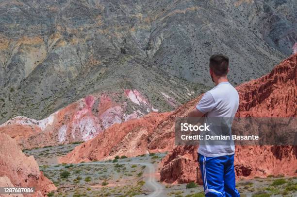 Male In Colored Landscape In Purmamarca Jujuy Argentina Stock Photo - Download Image Now