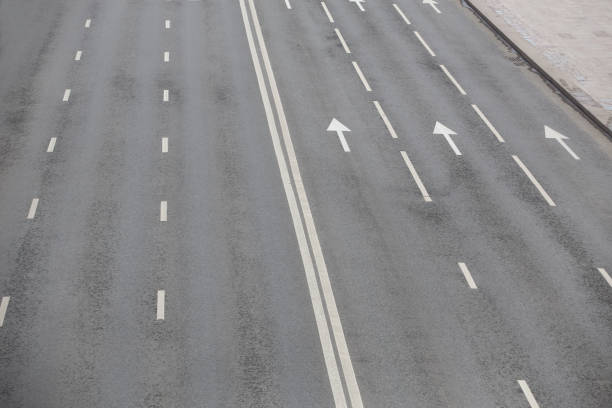 istock Multi-lane highway with markings on asphalt 1287689292