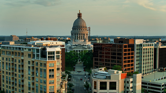 Aerial shot of the state capitol building in Madison, Wisconsin at sunset.