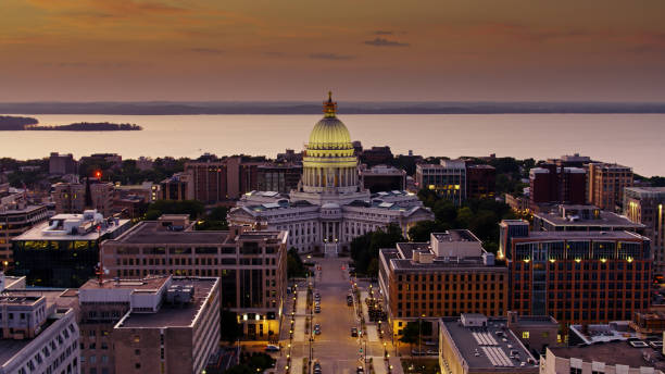 View from Drone Flight Over Madison, Wisconsin at Sunset Aerial shot of Madison, Wisconsin at sunset. madison wisconsin stock pictures, royalty-free photos & images