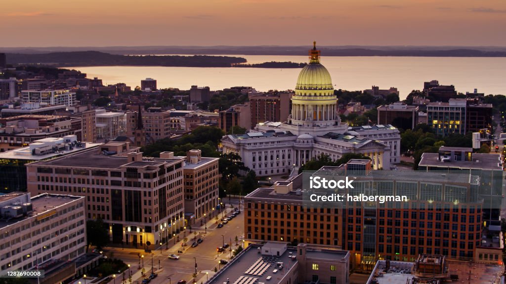 Aerial View of Wisconsin State Capitol, Downtown Madison and Lake Mendota at Sunset Aerial shot of Madison, Wisconsin at sunset. Madison - Wisconsin Stock Photo