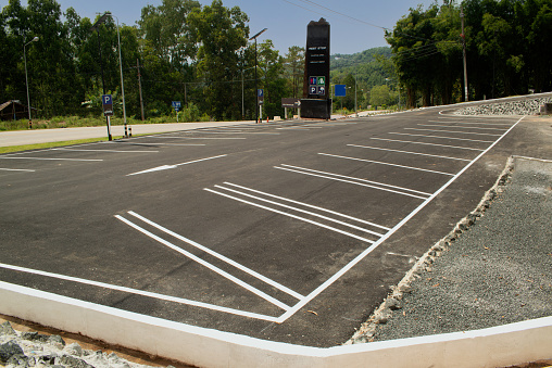 Parking lines on the asphalt, detail of signs for car parking.