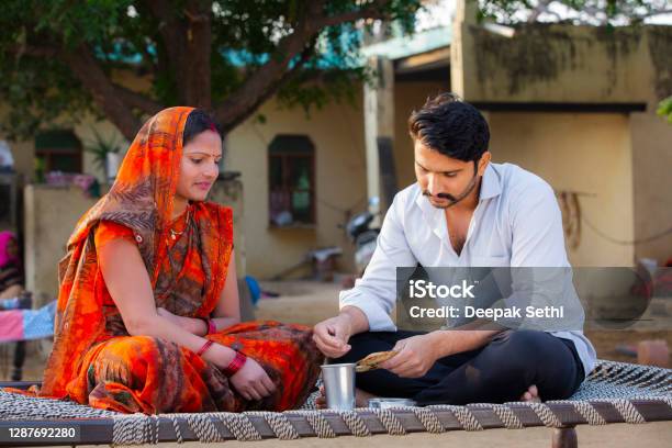 Young Couple Stock Photo Stock Photo - Download Image Now - India, Eating, Village - iStock Young Couple Stock Photo Stock Photo - Download Image Now - India, Eating, Village - iStock