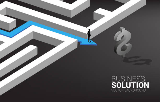 istock Silhouette of Businessman on route path to exit the maze to dollar icon. 1287693042