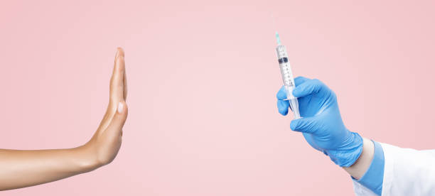 istock Refuse vaccination due to possible health problems. Say no to fake immunisation against viruses. 1287696091