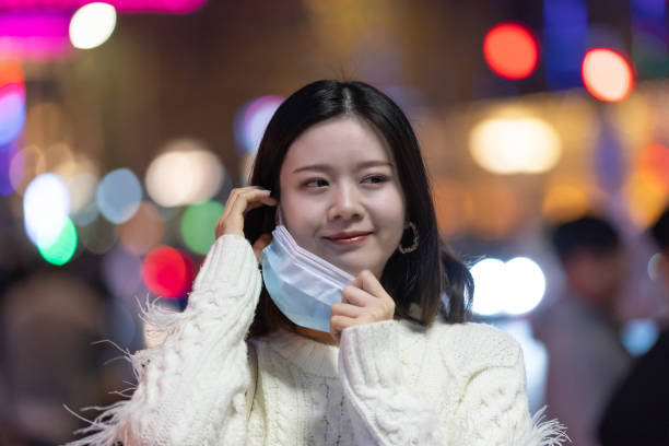 istock Asian women with masks removed 1287697044