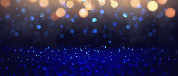 istock Sparkling lights, bokeh festive background with texture. 1287697112