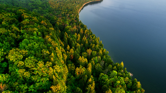 Aerial shot of the waters of Lake Michigan's Green Bay lapping against the shore of Peninsula Park, between the towns of Ephraim and Fish Cree in Door County, Wisconsin.