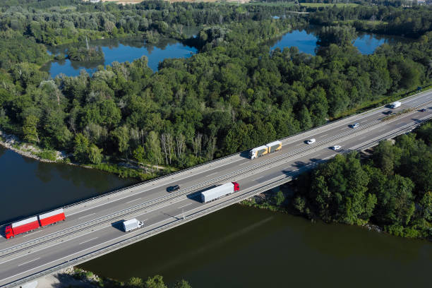 istock World at Work, Heavy Cargo on Highway Bridge, Aerial View 1287699943