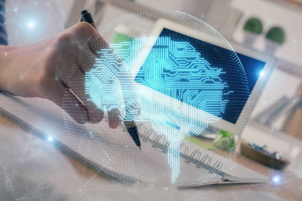 istock Multi exposure of writing hand on background with brain hologram. Concept of self learning. 1287704823