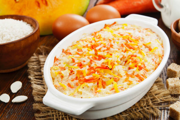 istock Pumpkin casserole with carrot and rice 1287706083