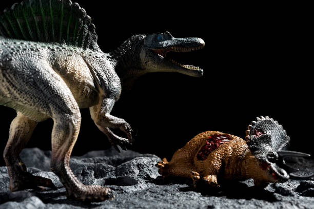 istock spinosaurus with a triceratops body on a ground with craters 1287706282