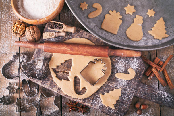 istock Making Christmas Cookies with traditional gingerbread cookies ingredients 1287708199