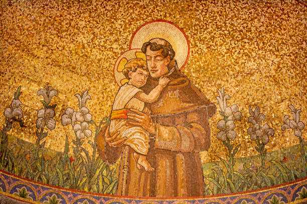 Belaggio - The mosaic of St. Anthony of Padus in church Chiesa di San Giacomo by Venetian school from end of 19. cent. Belaggio - The mosaic of St. Anthony of Padus in church Chiesa di San Giacomo by Venetian school from end of 19. cent. st anthony of padua stock pictures, royalty-free photos & images