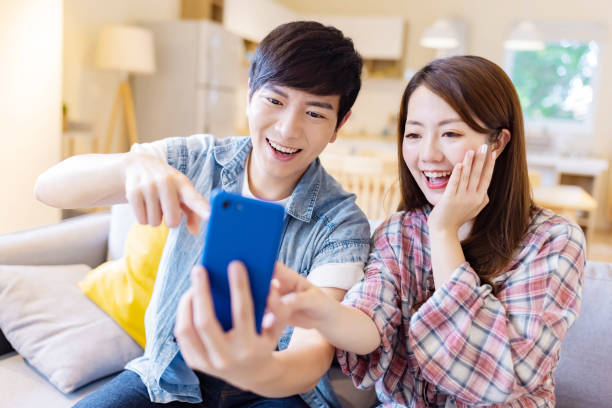 istock asian couple take selfie 1287713017