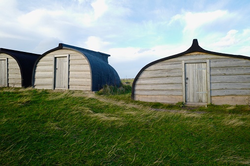 Holy Island traditional sheds made of upturned fishing boats