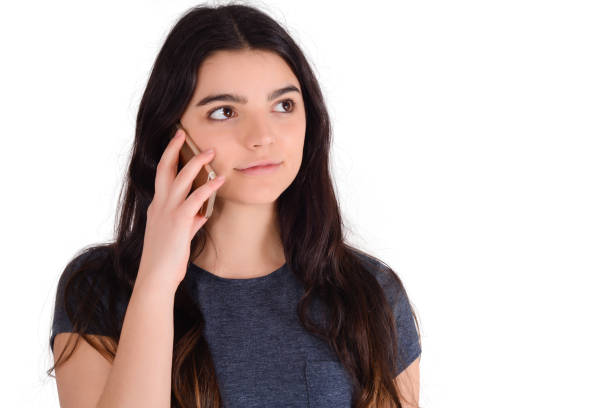 istock Young woman talking on the phone. 1287723008